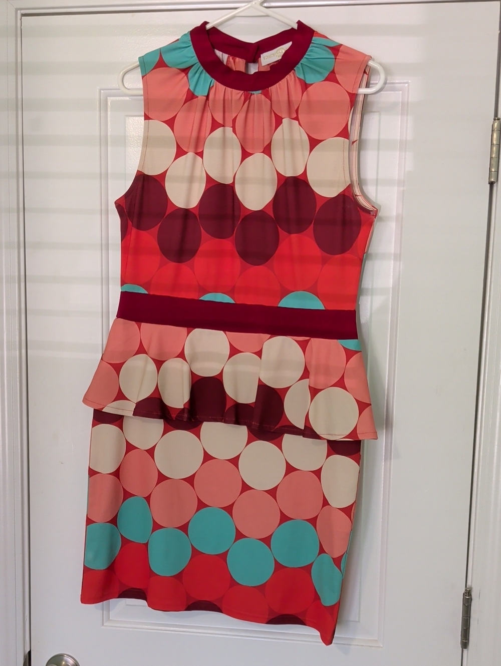 Tracy Negoshian Sleeveless Peplum Dot Dress in Coral, Teal & Wine